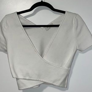 Babaton criss cross top in medium